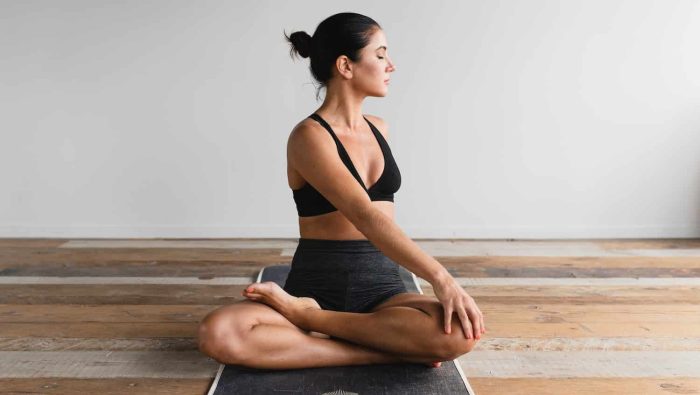 woman performing yoga