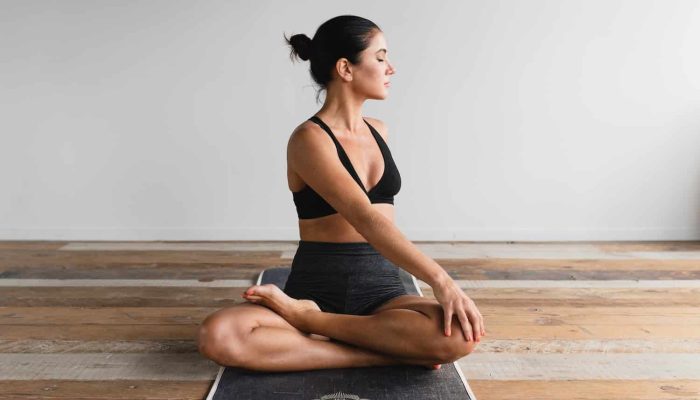 woman performing yoga