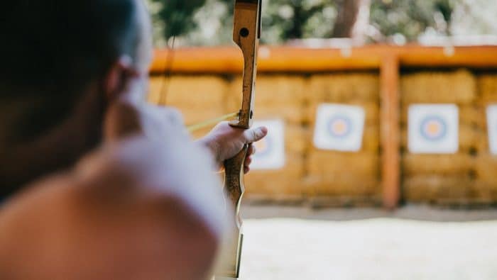 person holding arrow