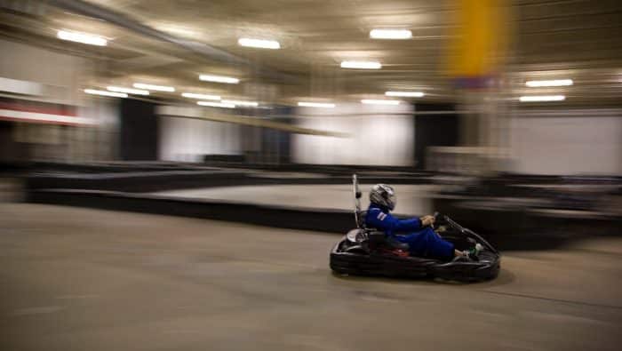 man riding on go-kart