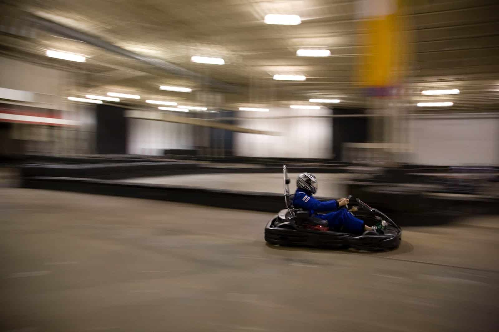 man riding on go-kart