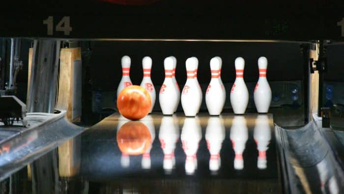 bowling ball going to hit bowling pins